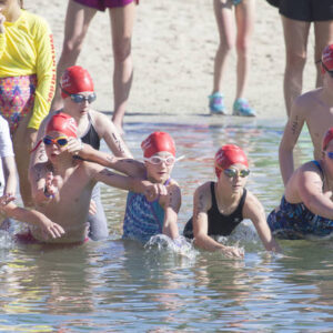 kids enter the lagoon at the Hilton Waikoloa Village to start the Lavakids Aquathlon